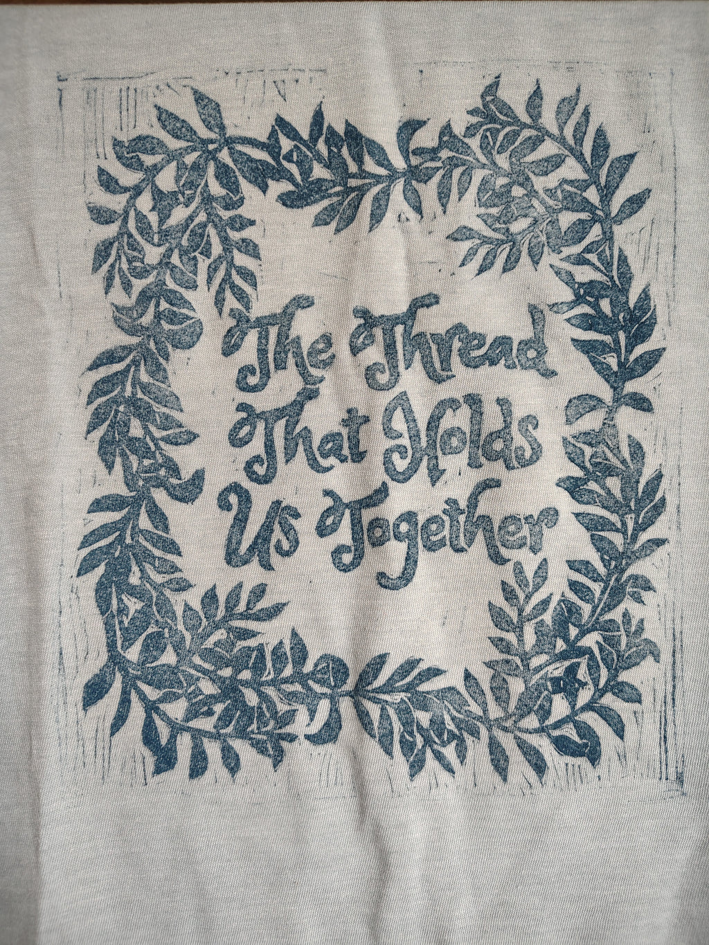 Hand Block Printed Graphic Tee — The Thread That Holds Us Together – Organic Cotton Blend Tee