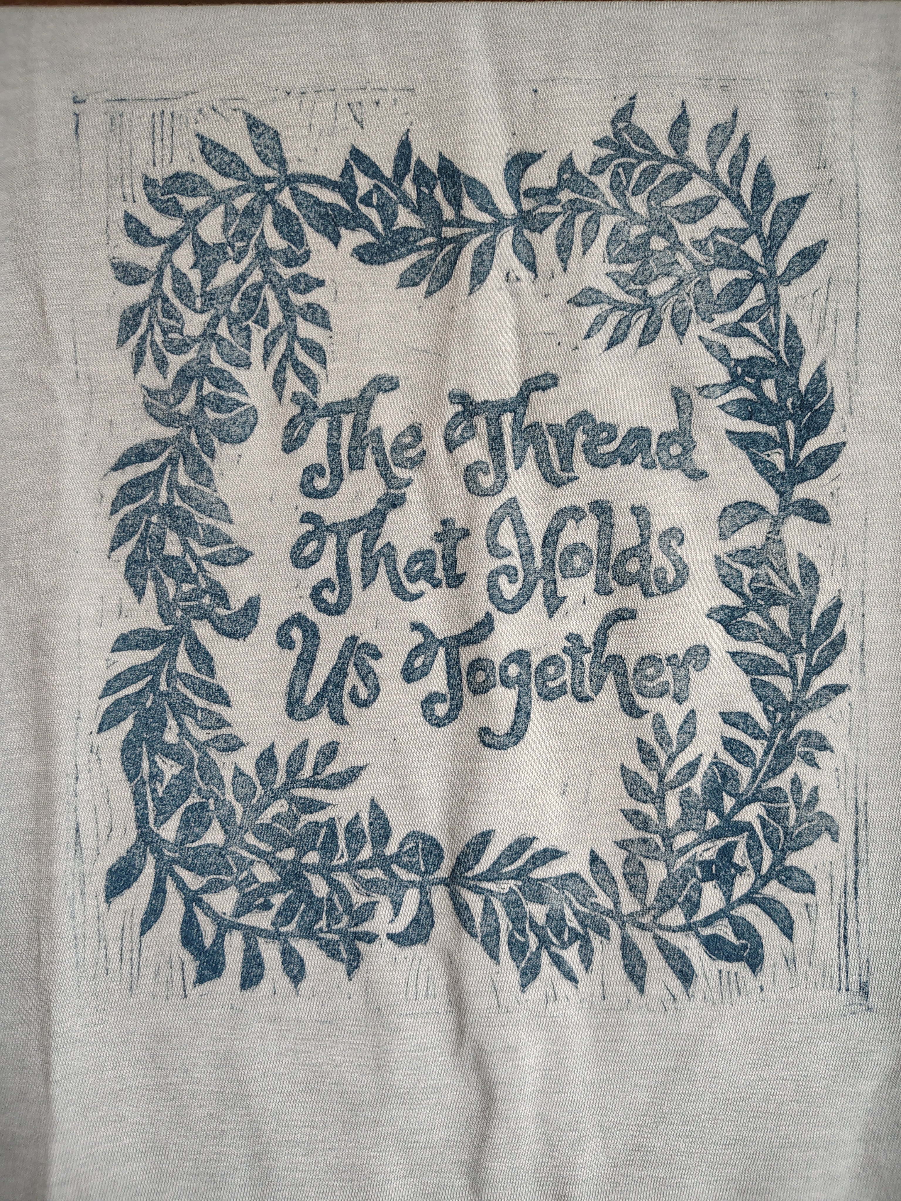 Hand Block Printed Graphic Tee — The Thread That Holds Us Together – Organic Cotton Blend Tee
