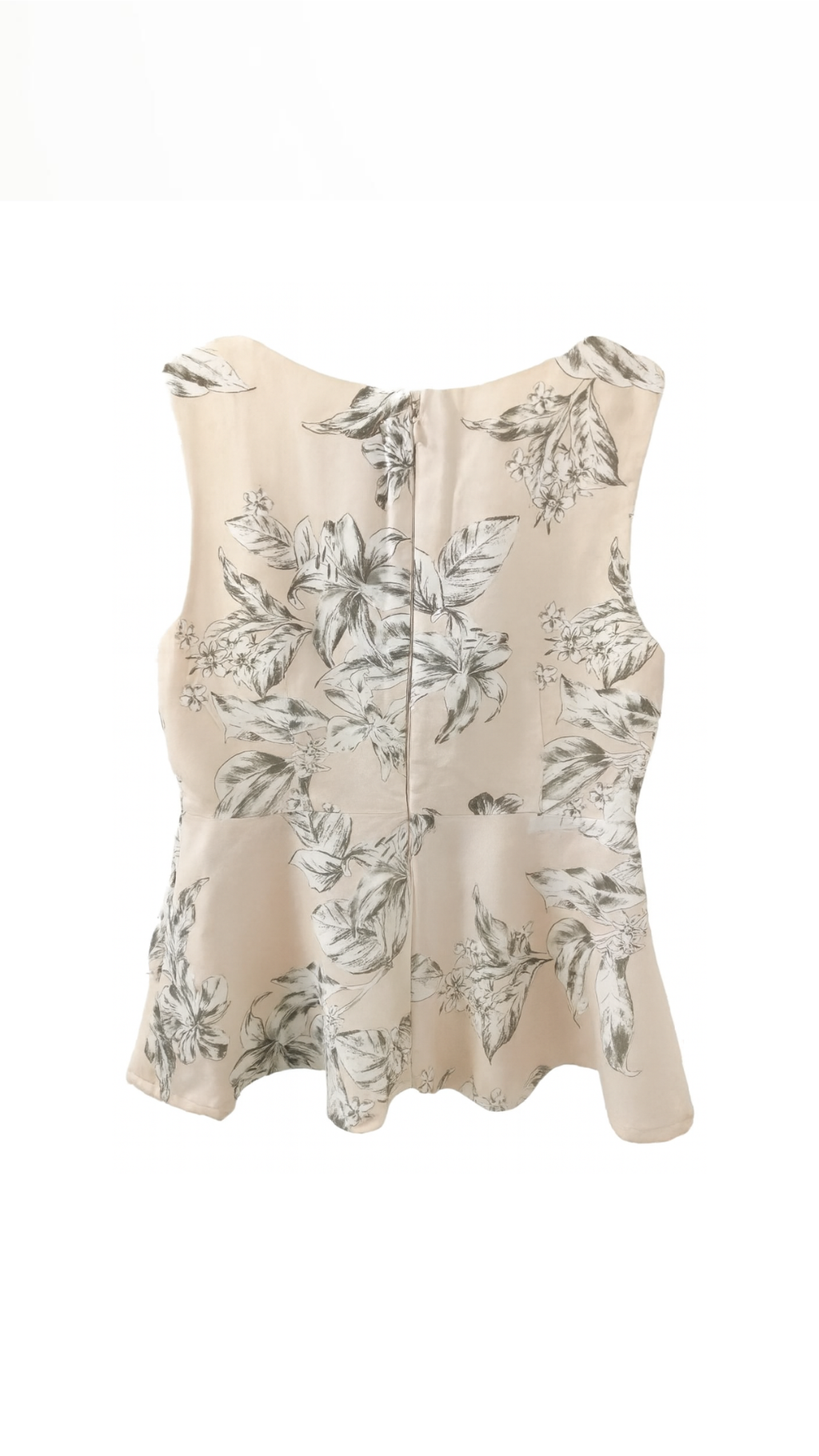 Back view of the beige floral linen blend peplum blouse showing the zipper closure and layered flare hem